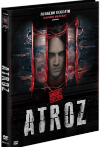 Atroz · Extreme / Extreme Cinema · Cover A · Männergesicht hinter roten Metallstreben